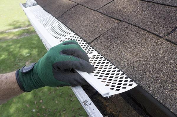 gutter guards help to prevent debris buildup and clogging in your gutters, reducing the need for regular cleaning and maintenance